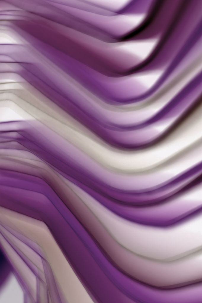 A smooth and elegant abstract wave design with purple tones, perfect for modern backgrounds.